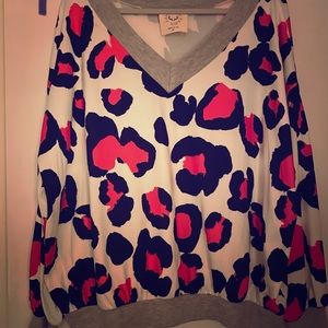 Pink animal print weekender top